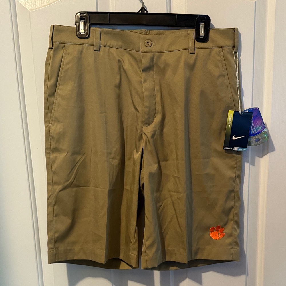 Nike Men's Khaki Shorts with Orange Logo